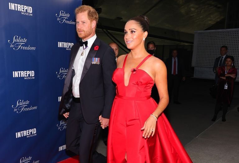 Meghan Markle Causes a Stir By Wearing A Daring Crimson Dress