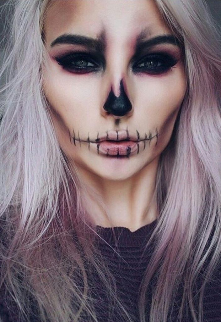Skull face #2 | 11 Creepy and Cool Halloween Makeup Ideas to Try This Year | HerBeauty