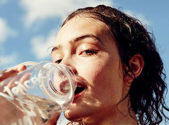 Increase water intake | 9 Best Tips To Get Glowing Skin In Summer Naturally | Her Beauty